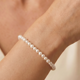 Bracelet with white cultured pearls 3 - 4 mm in 14K yellow gold Ivory Thread