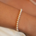 Brățară cu perle naturale de cultură roz, 5–5,5 mm, purtată