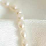 Brățară cu perle de cultură albe rice shape din aur 14K Elongé