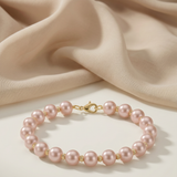 Bracelet with pink cultured pearls 5 – 6 mm in 14K Rose Dorée gold